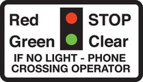 Miniature warning lights at level crossings