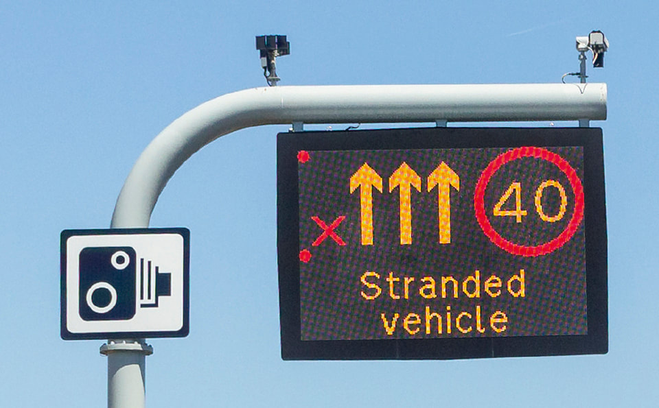 signals and signs indicating lane closures