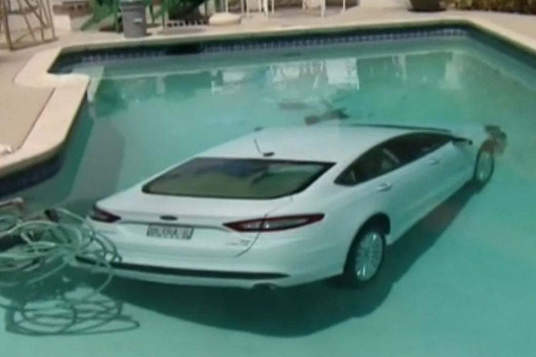 car in the swimming pool