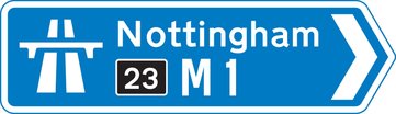 At a junction leading directly into a motorway (junction number may be shown on a black background)